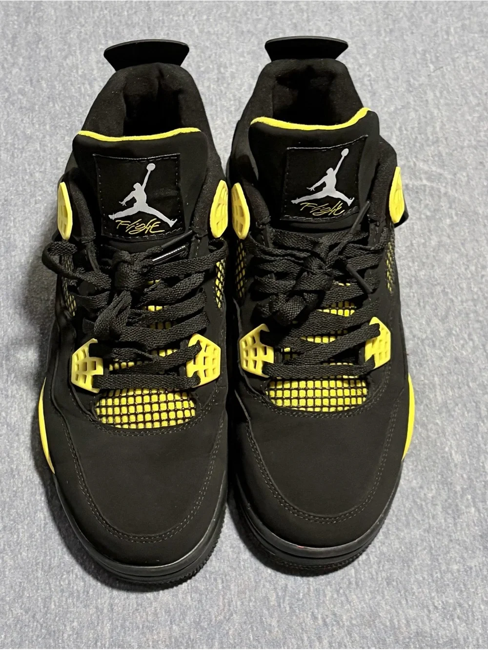 Jordan 4 Retro “Thunder” - Black/Yellow